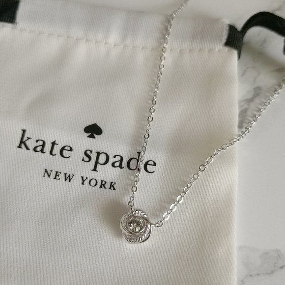 NWT KATE SPADE INFINITY BEYOND KNOT MINI PENDANT SILVER W DUST BAG